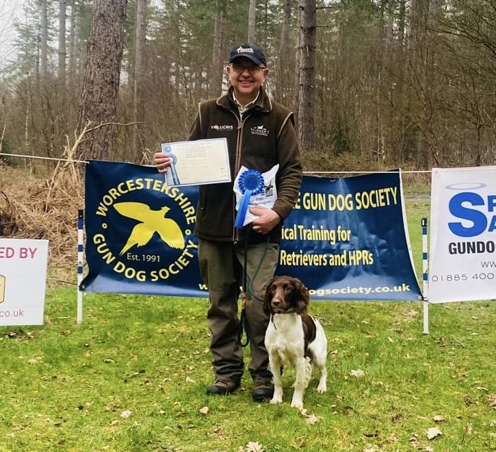 Mark and Cola with their certificate